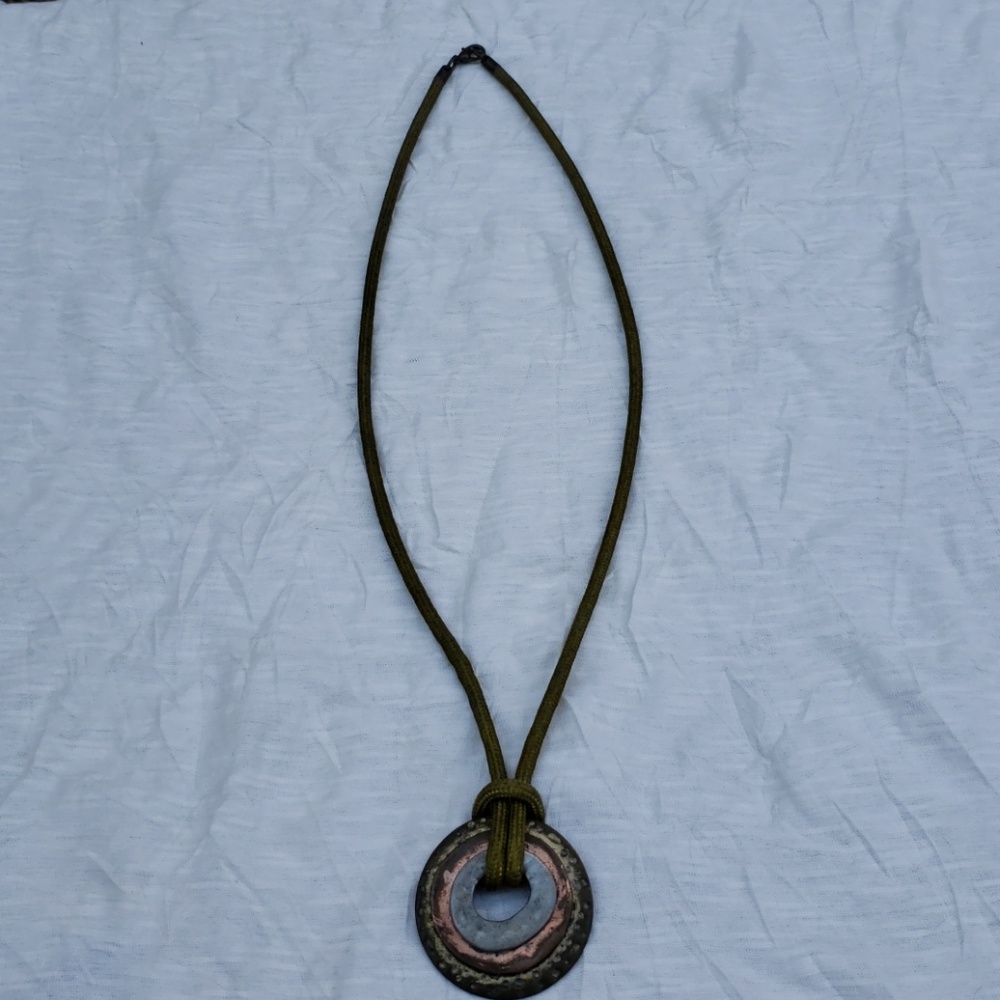 Rustic three tier ring necklace.